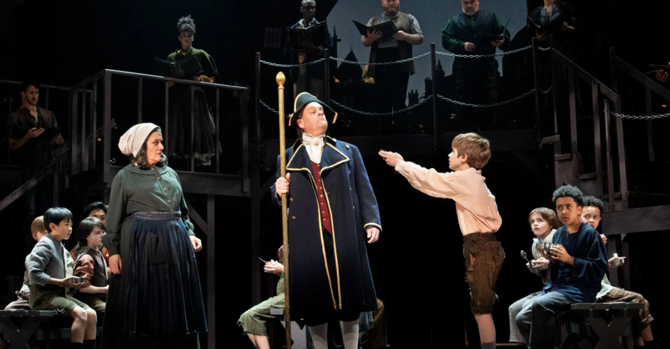 Mary Testa as Widow Corney, Brad Oscar as Mr. Bumble and Benjamin Pajak as Oliver, with in the Encores! production of “Oliver!” at New York City Center. Credit Sara Krulwich/The New York Times