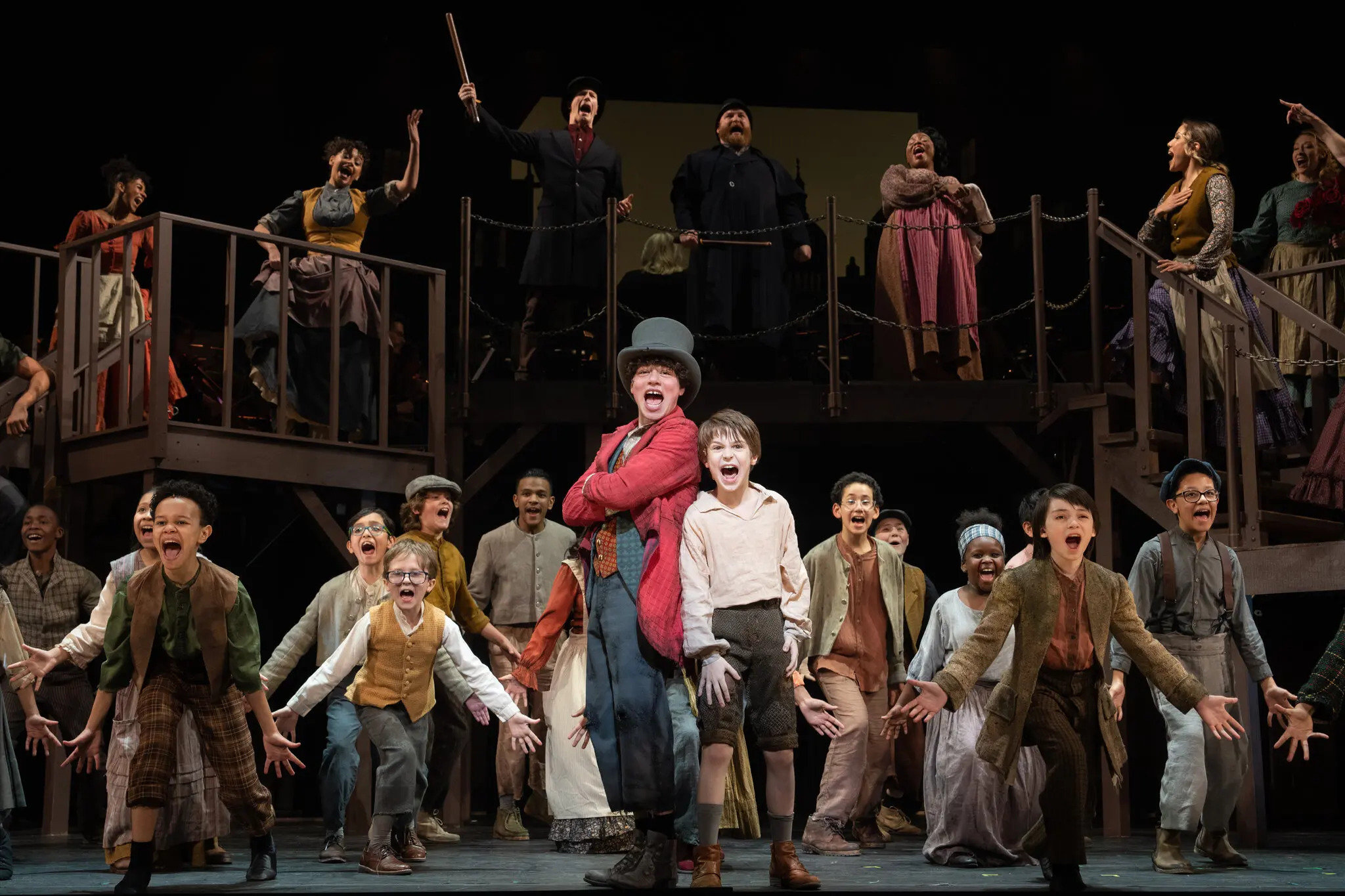 Julian Lerner, center left, as the Artful Dodger in a number with Pajak, other cast members and students. Credit Sara Krulwich/The New York Times